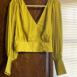 Citron green cropped blouse. Deep vneck with button closure. Never worn